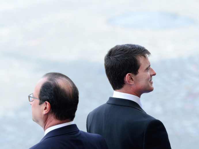 François Hollande et Manuel Valls, au défilé du 14 Juillet, à Paris (LCHAM/WITT/SIPA)